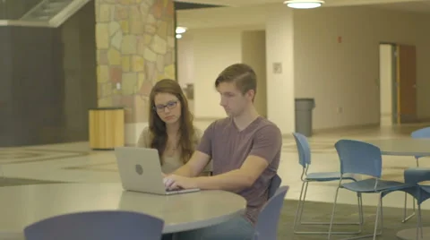 Couple Working on a Laptop Together Stock Footage 60989418