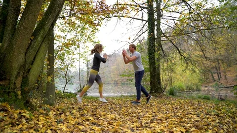 Couple working out together on public park, Zagreb, Croatia. Video stock 102533463