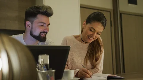 Couple working together from home Stock Footage 100001627