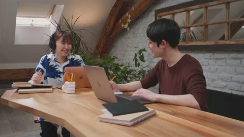 Couple working together at home. Stock Footage 153497902