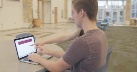 Couple Working Together on a Laptop Stock Footage 60992357