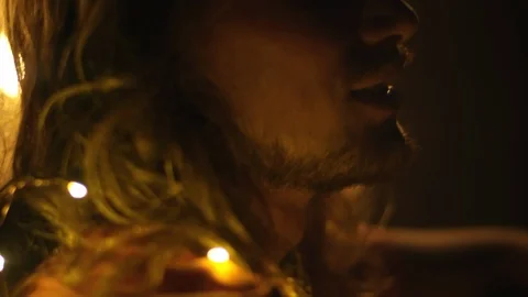 Couple Wrapped in String Lights Stock Footage 90144604