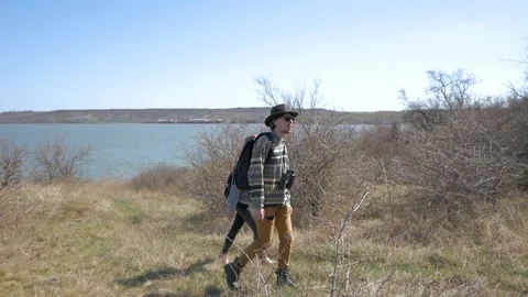 Couple of young hikers Stock Footage 90194394