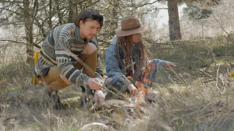 Couple of young people in forest Stockbeeldmateriaal 88719331