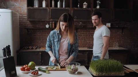 Coupled is cocking health lunch in the kitchen. Stock Footage 87839712