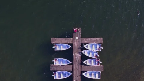 CoupleoverheadonDock2 Stock Footage 95861093