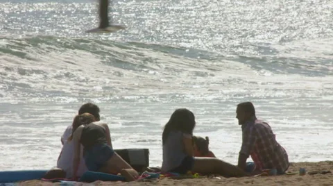 COUPLES AT BEACH IN SLOW MOTION Stock Footage 5685154