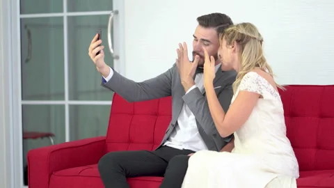 Couples chat over video calls and show off their wedding rings happily. Stock Footage 142741394