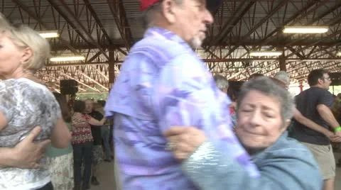 Couples dancing past camera 2 Stock Footage 11151865