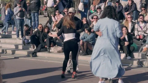 Couples dancing salsa on the street Stock Footage 247130862