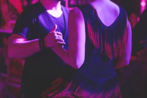 Couples dancing traditional latin argentinian dance milonga in the ballroom.. Fotos de archivo