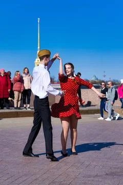 Couples dancing on Victory Day on St. Petersburg Square Stock Photos