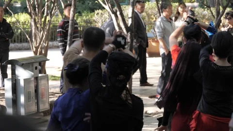 Couples do classical dance in park,Kunming,Yunnan,China Stock Footage 124557228