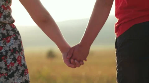 Couple's hands in sunset time 스톡 동영상 53281908