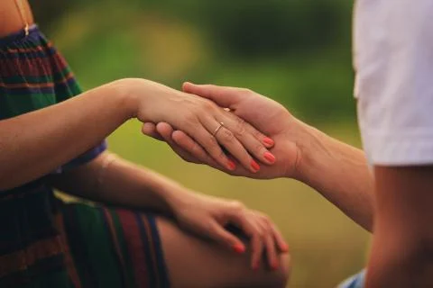 A couple's hands, wedding ring, love, nails Stock Photos