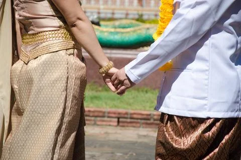 Couples holding hands Stock Photos