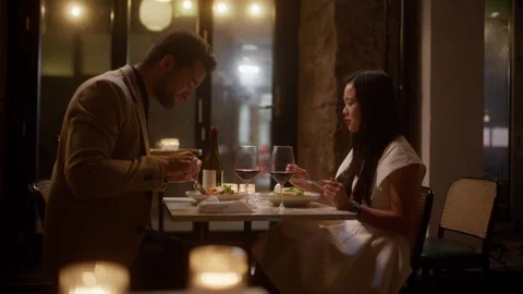 Couple's Intimate Dinner At A Restaurant 스톡 동영상 284932196