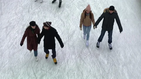 Couples in love skate on ice. View from above. Stock-Footage 146776822