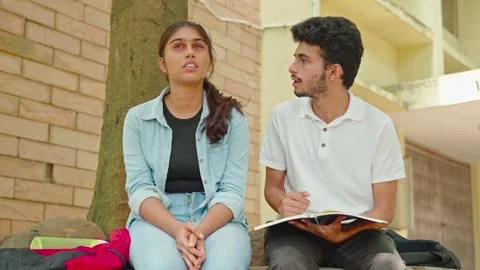 Couples or friends are fighting eachother on college campuses in their free time Stock Footage 246971313