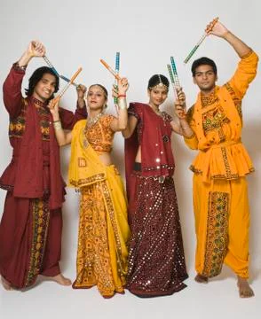 Couples performing dandiya 写真素材