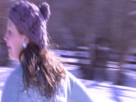 A couple's play in the snowfall Stock Footage 23106205