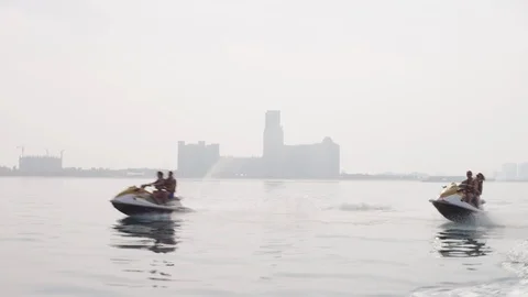 Couples riding on jet ski. Stock Footage 119395657