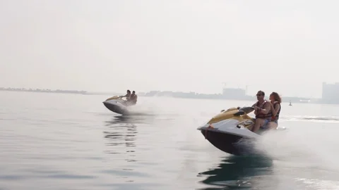 Couples riding on jet ski. Stock Footage 119395721