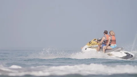 Couples riding on jet ski. Stock Footage 119396249