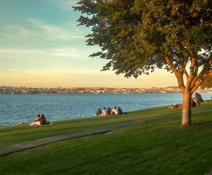 Couples on the riverbeach Stock Photos