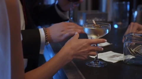 Couples Sip Together, Two Friends Share Quiet Drinks, Pair Converses Softly Over Stock Footage 323771706