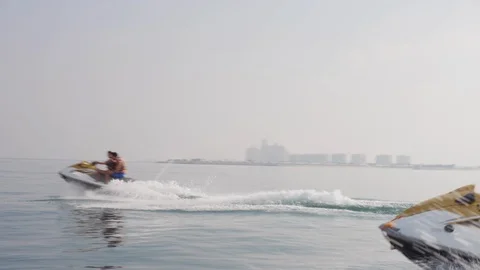 Couples speeding on jet ski. Stock Footage 119395652
