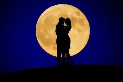 Couples stand a month in back Stock Photos