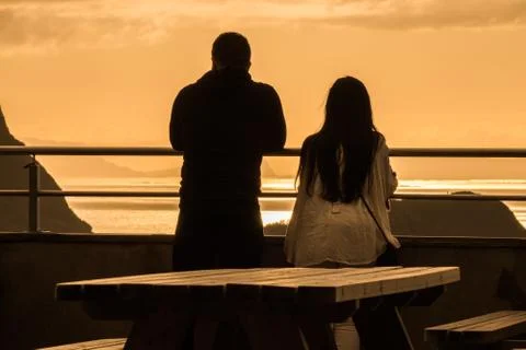 Couples at sunset By Linus Stock Photos