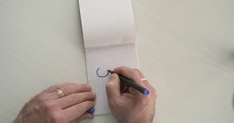 Couples Together - this word is written on the sheet by a man's hand  Stock Footage 267085806