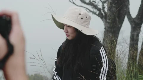 Couples of tourists blogger using action camera to record journey in mountains. Stock Footage 166296356