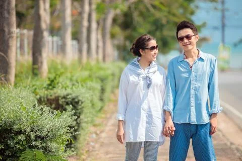 Couples walking together Stock Photos