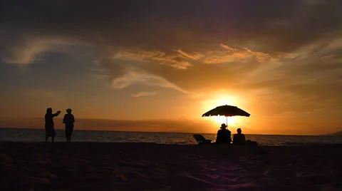 Couples Watching Ocean Sunset Stock Footage 23533246