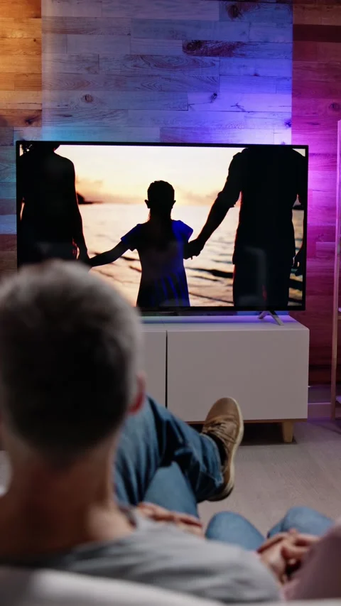Couples Watching TV At Night Stock Footage 230999113