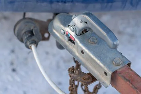 Coupling device or towing device for attaching a trailer to a vehicle. Stock Photos