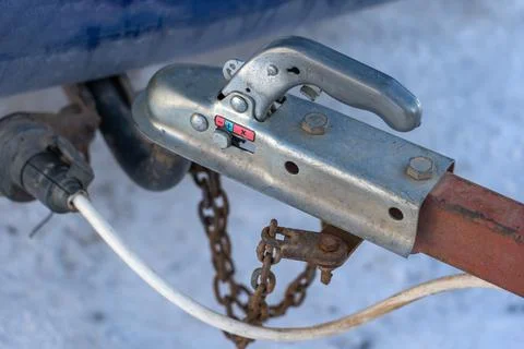 Coupling device or towing device for attaching a trailer to a vehicle. Select Stock Photos