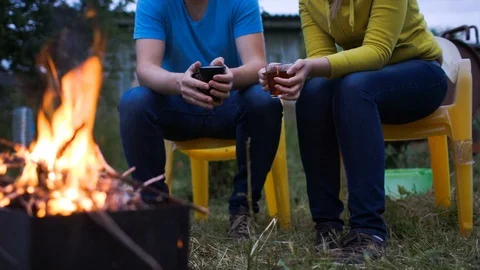 Couply camp fire spring Stock Footage 128740330