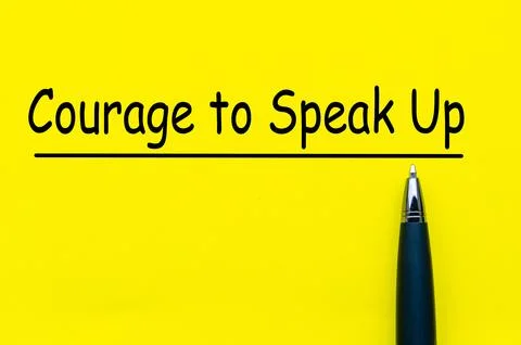 Courage to speak up text on yellow notepad. Speak up culture Stock Photos