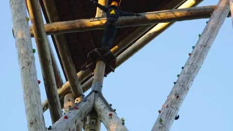 Courage Test. Person Deliberately Falling From Platform Relying On Safety Line. Stock Footage 265129647