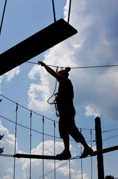 Courageous boy at rope park Stock Photos