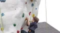 Courageous Young Boy Climb Up Artificial Rock Wall Kids Playground Outdoor Park HD Footage