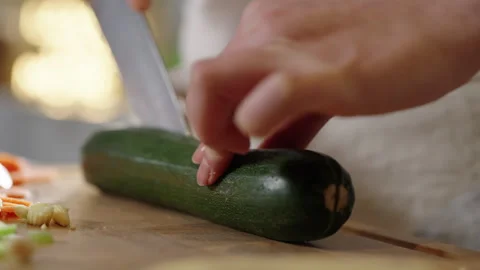 Courgette Cut on Chopping Board Stock Footage 254596722