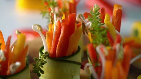 Courgette veggie rollo with red, orange and yellow peppers Stock Footage 132602830