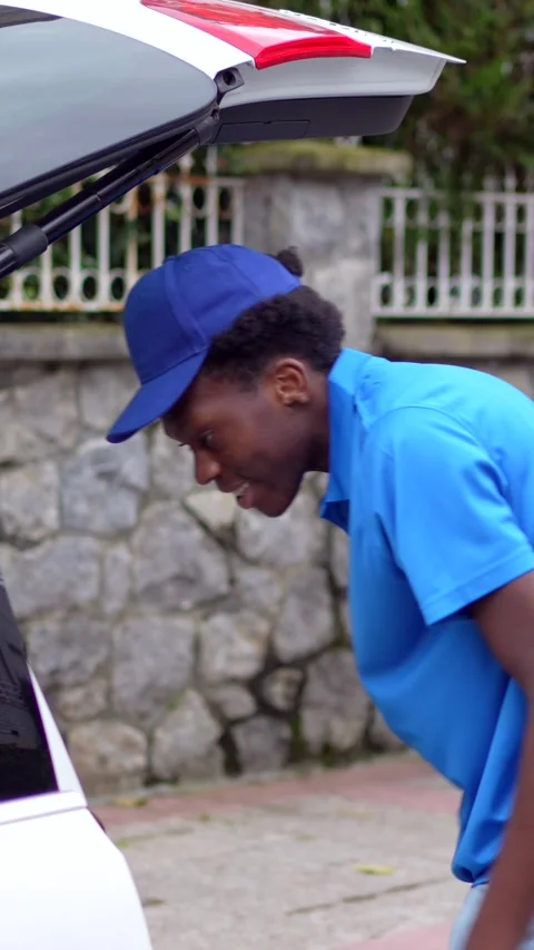 Courier checking the parcel for delivery Stock Footage 284510969