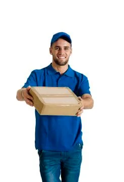 Courier guy holding a package for delivery. Stock Photos