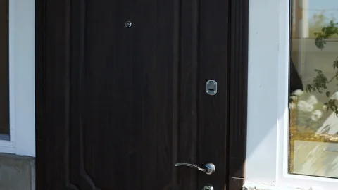 Courier man knocking the door delivery box with exotic fruits food, contactless Stock Footage 130170834